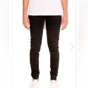 Cohesive & Co. The Josh Basic Joggers Knit Denim in Jet Black. Size Medium.